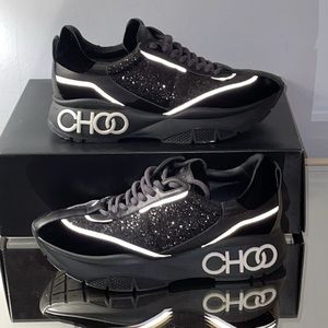 9 Jimmy Choo Black & White Shimmer Shoes
Raine galactica glitter sneakers 8.5
